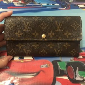 SOLD!! Authentic Louis Vuitton Sarah Wallet